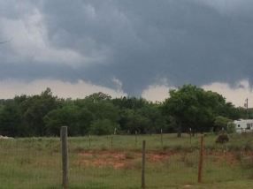 Picture taken with my iPhone of a tornado forming just north of my home in Bridge Creek, Oklahoma 5/20/2013
