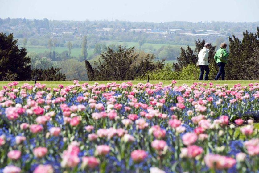 People enoy the sunny weather in the gardens at Cliveden House, Buckinghamshire (Rex Features)