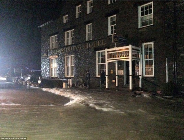 As homeowners were beginning the huge clean-up operation to salvage as many of their possessions hit by the first wave of flooding as possible, the River Beck burst its banks again last night and sent raging torrents through the small village of Glenridding, Cumbria. (Photo by DailyMail)